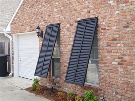 metal shutter house forida|florida shutters reviews.